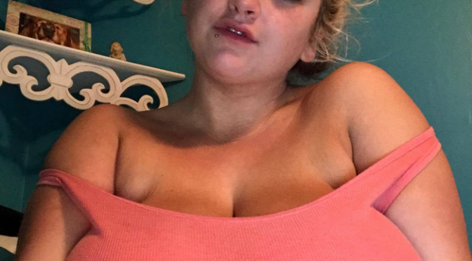 Blonde with impressive huge tits