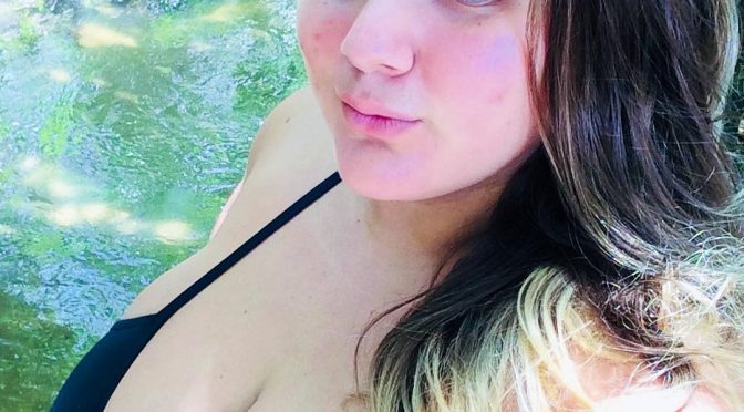 Blonde teen with huge breasts